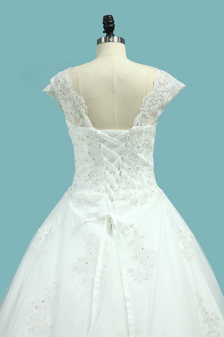 A Line V Neck Wedding Dresses Tulle With Applique And Beads Lace Up